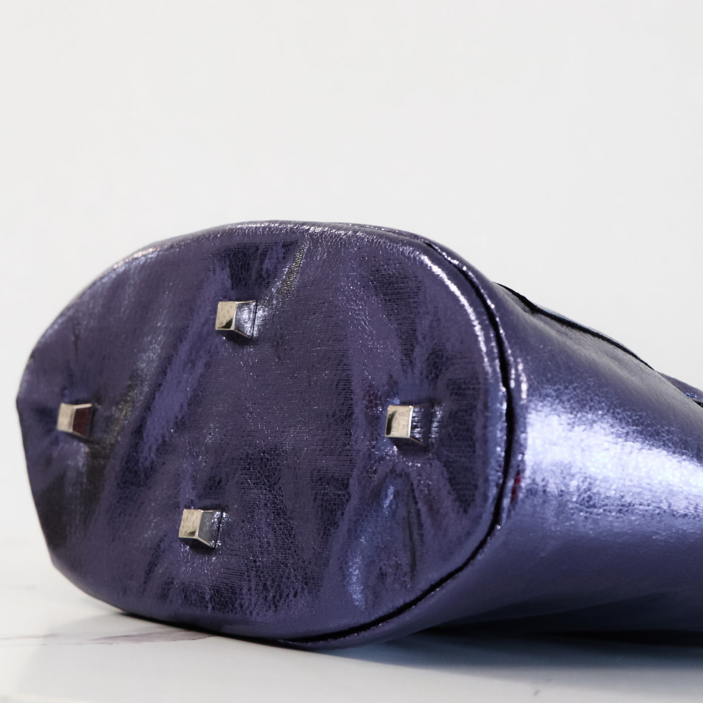 Quatre pieds de sac à prisme