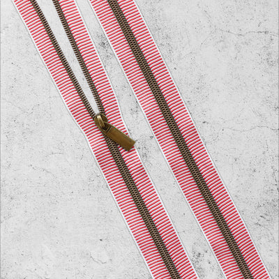 Cremalleras en espiral de nailon a rayas blancas y rojas 