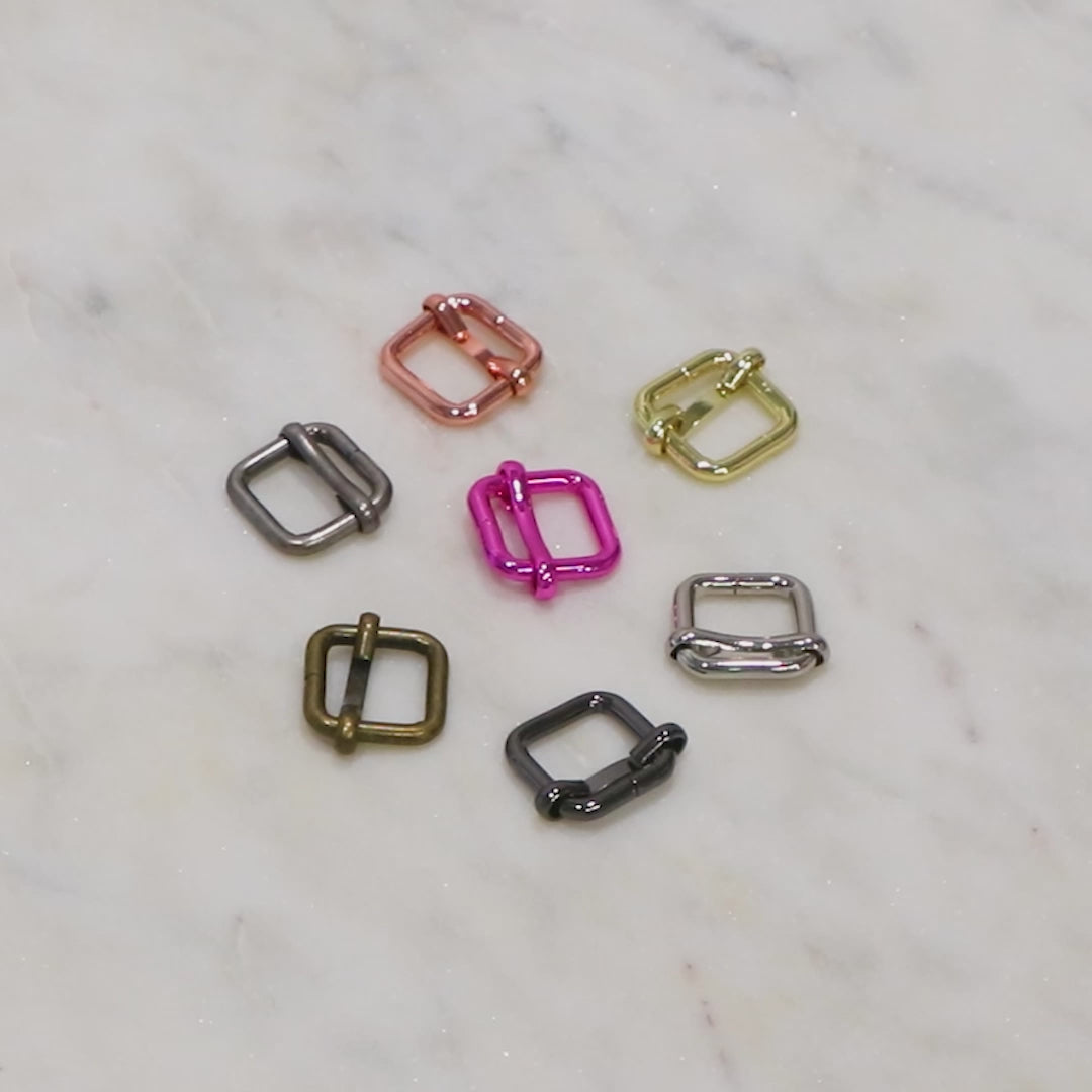 Two Tula Pink 1/2" Slider Buckles