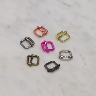 Two Tula Pink 1/2" Slider Buckles