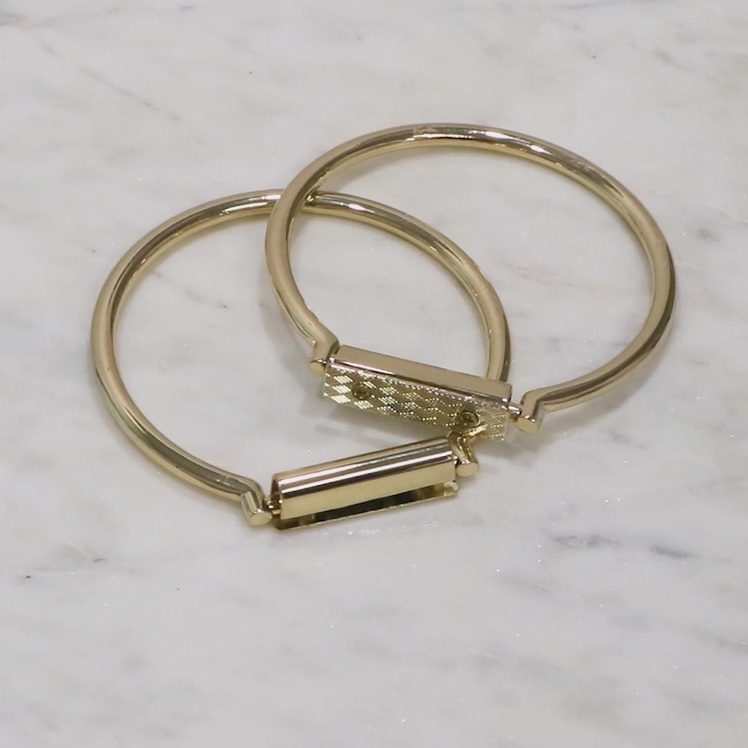Dos asas redondas para bolso.