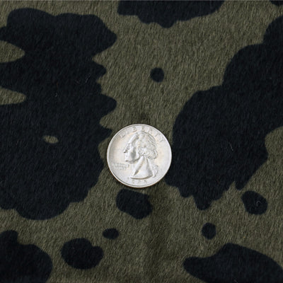Packaged 1/2 Yard Cut: Cow Black Olive Faux Fur